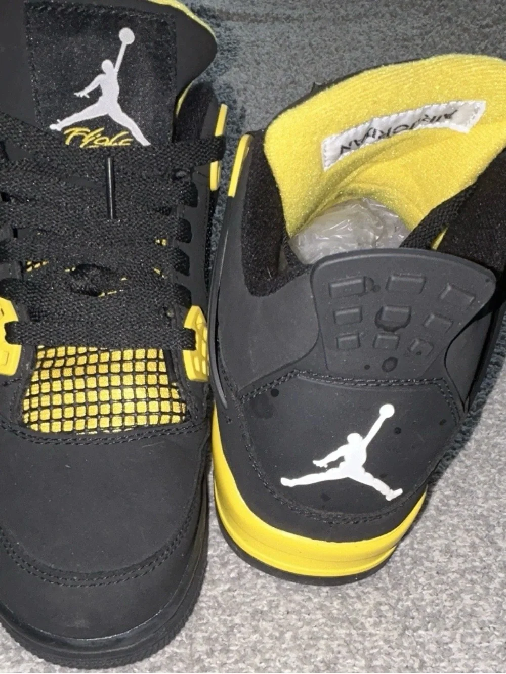 Jordan Retro 4 Black and Yellow Sneakers